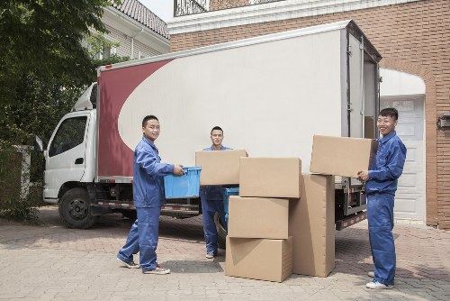 Professional movers loading a truck