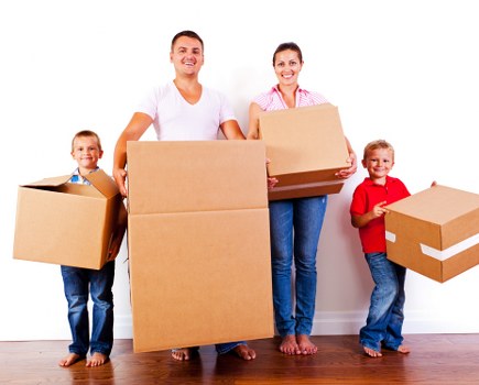Secure packing and loading of belongings in a removal truck.