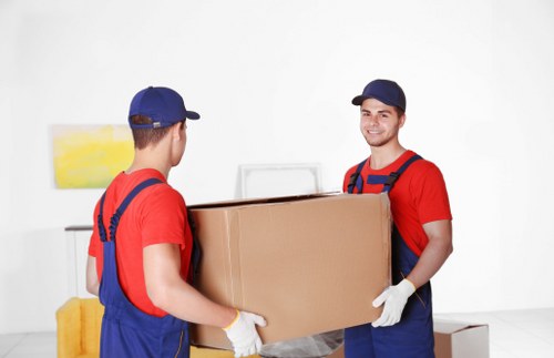 Customer and removalist team finalizing a move in Twickenham